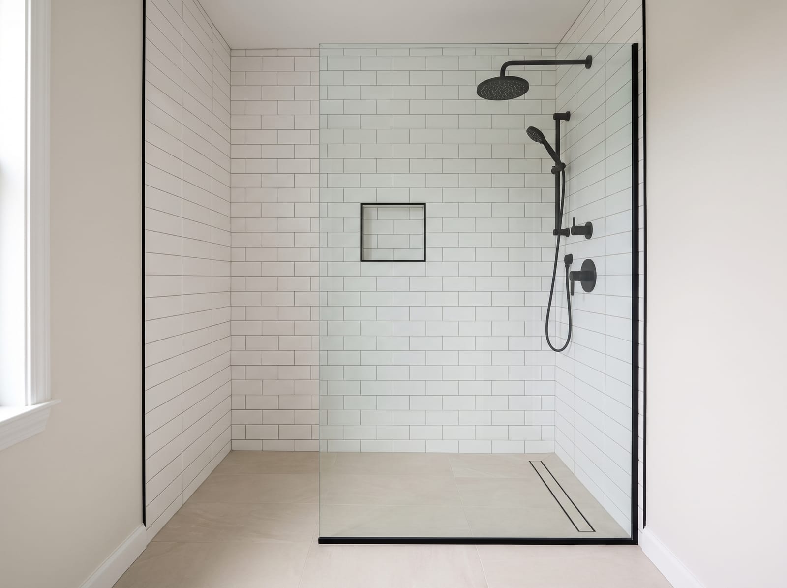 A remodelled bathroom with a tiled shower and vanity