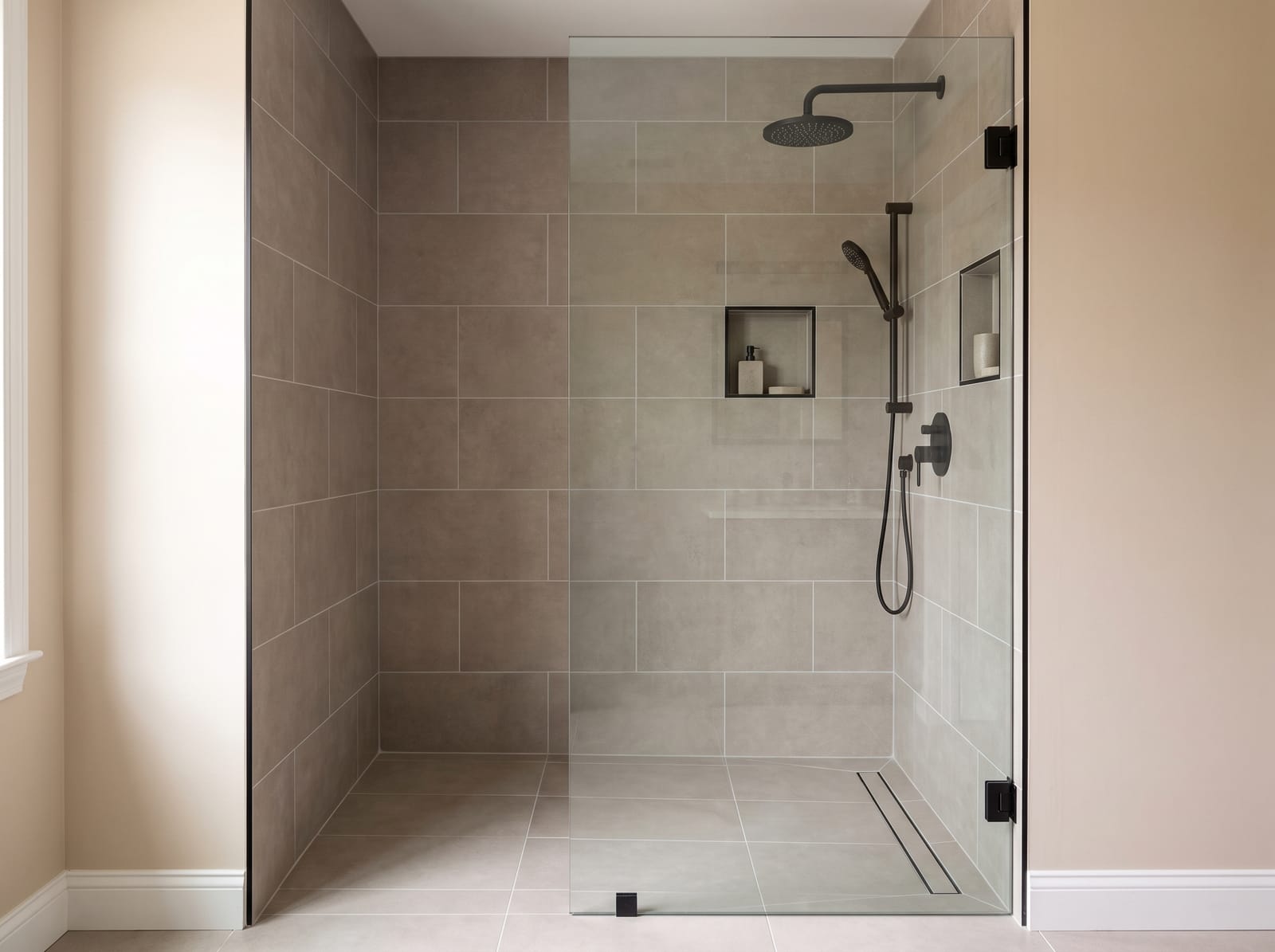 A low-threshold walk-in shower fitted where a bath used to be